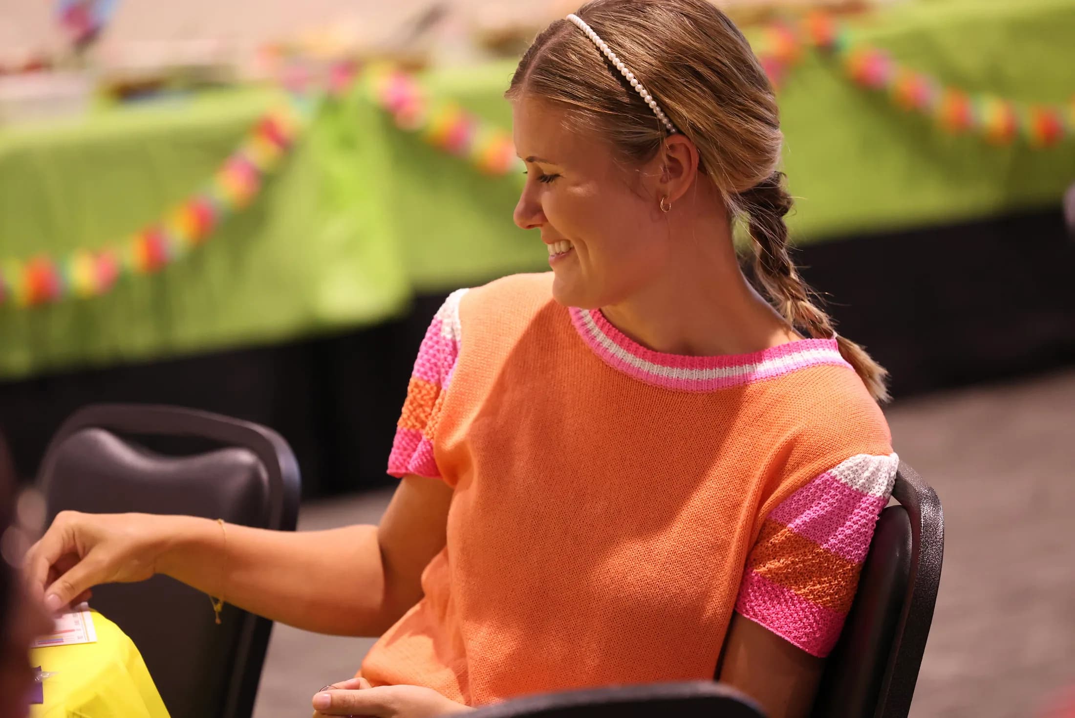 A woman participates in a First Bossier women's ministry event.